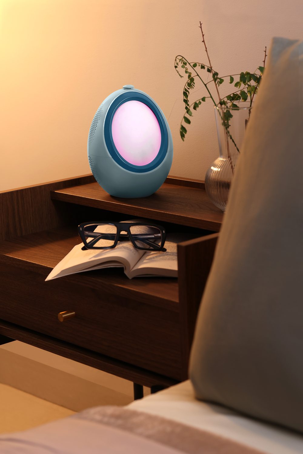 The Naptick device resting on a bedside table